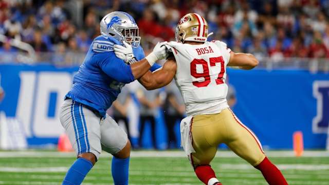 Detroit Lions offensive tackle Penei Sewell blocks San Francisco 49ers Nick Bosa.